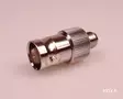 ADAPTERI BNC-n / SMA-n TASAPOHJA PITKÄ - Liitinadapterit - 704305 - 2
